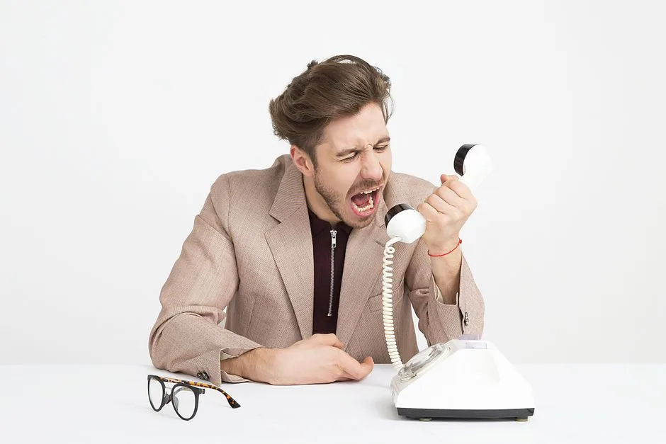 Business owner reviewing a list of missed calls on a phone