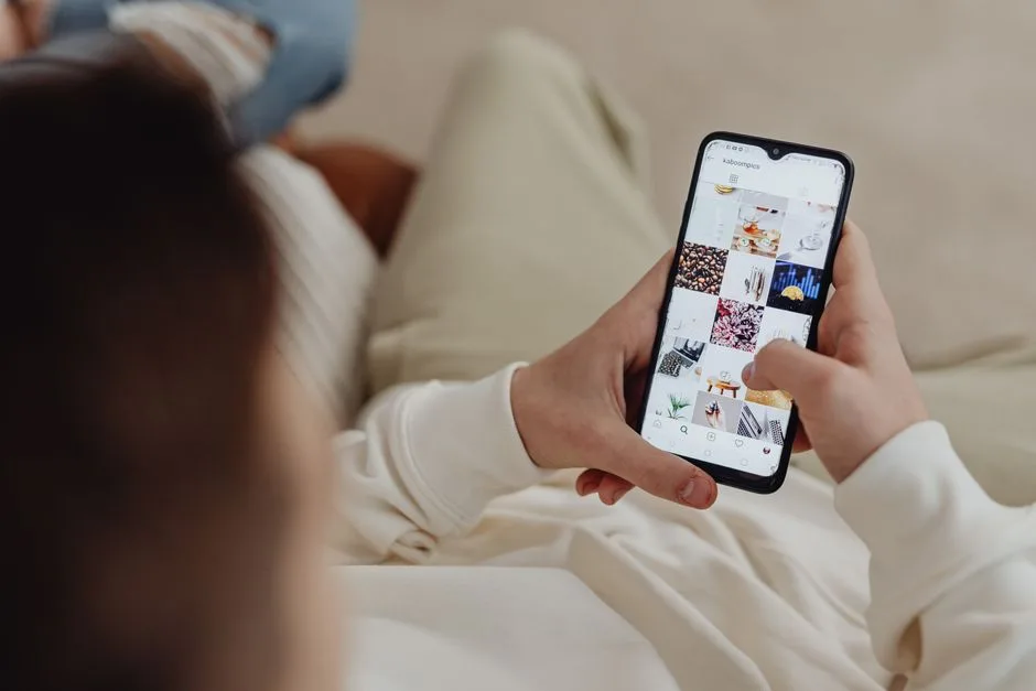 Person scrolling through comments on a phone