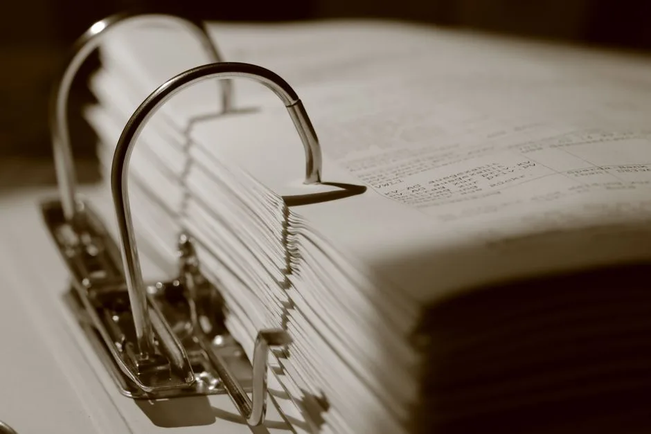 Open binder of business documentation