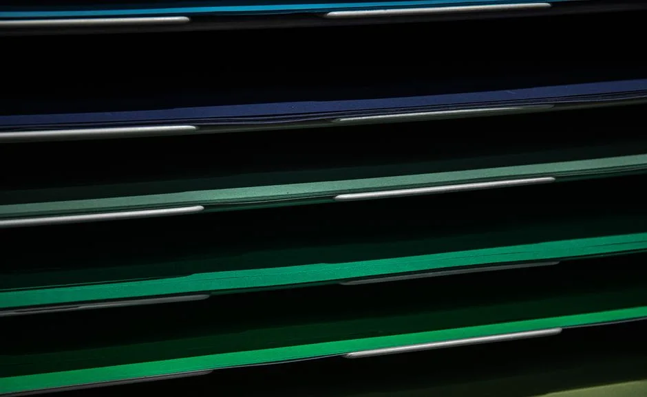 Stack of documents on an office shelf